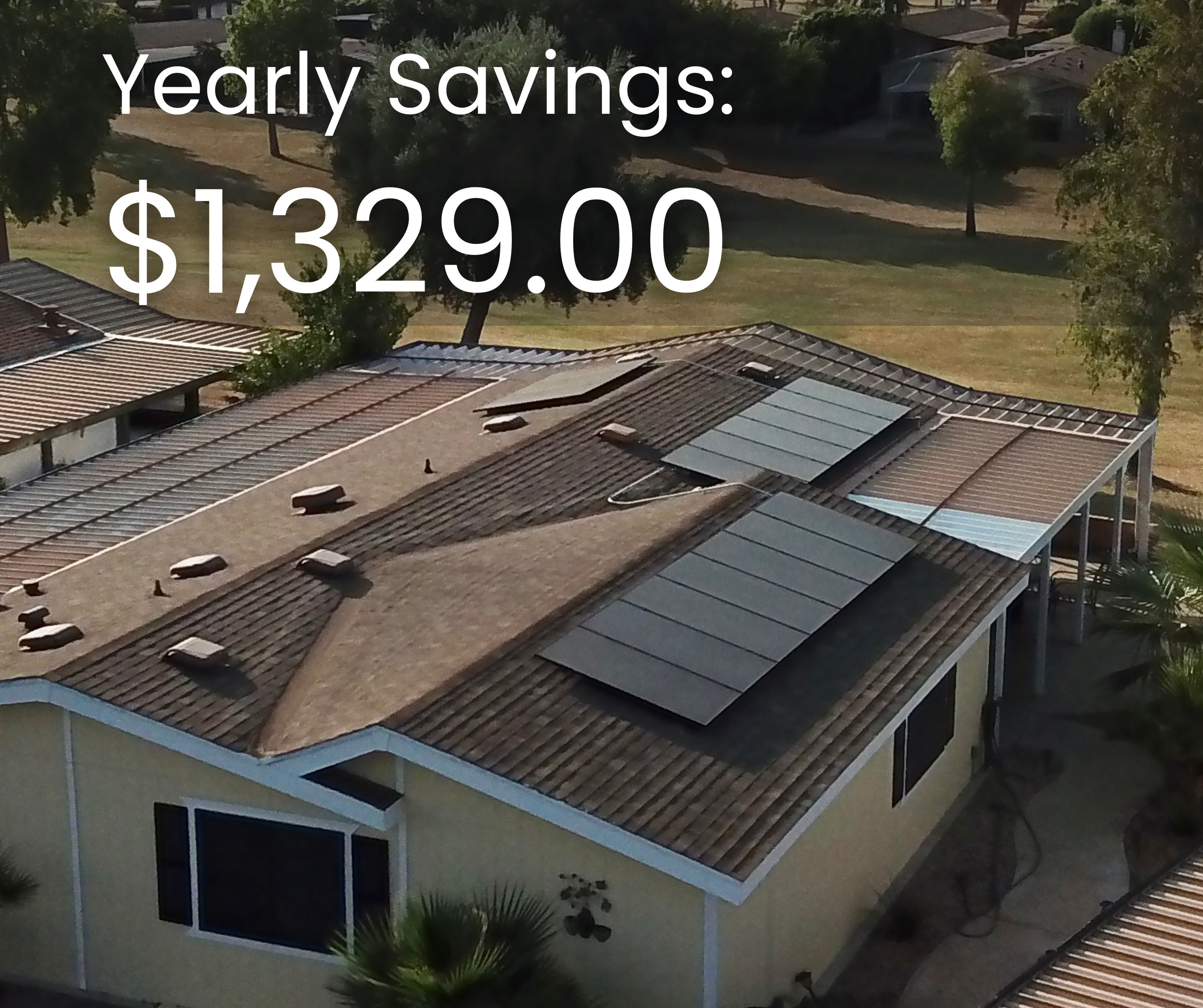 Yearly savings of $1,329.00 displayed over a mobile home with solar panels installed on the roof, highlighting the financial benefits of switching to solar energy.
